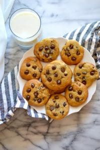 Lighten up the classic chocolate chip cookie by using less butter. Super soft and filled with chocolate chips, these Healthier Greek Yogurt Chocolate Chip Cookies are a crowd favorite!