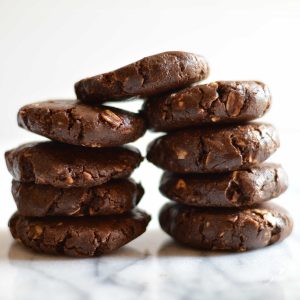Chocolate No Bake Shakeology Cookies on a marble surface.