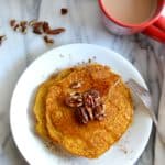 Healthier pumpkin pancakes are made gluten free and lightened up a bit by using better-for-you ingredients.