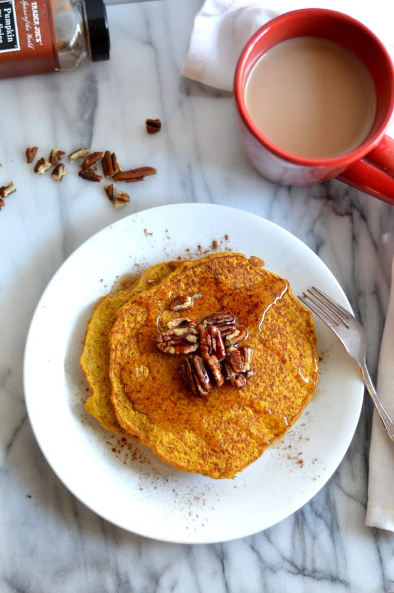 Healthier pumpkin pancakes are made gluten free and lightened up a bit by using better-for-you ingredients.
