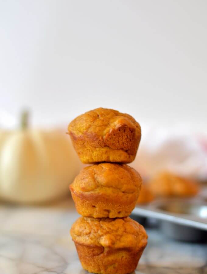 Mini pumpkin muffins are the perfect poppable fall breakfast and pair perfectly with a cup of coffee. These mini muffins are lightened up and contain no butter or oil.