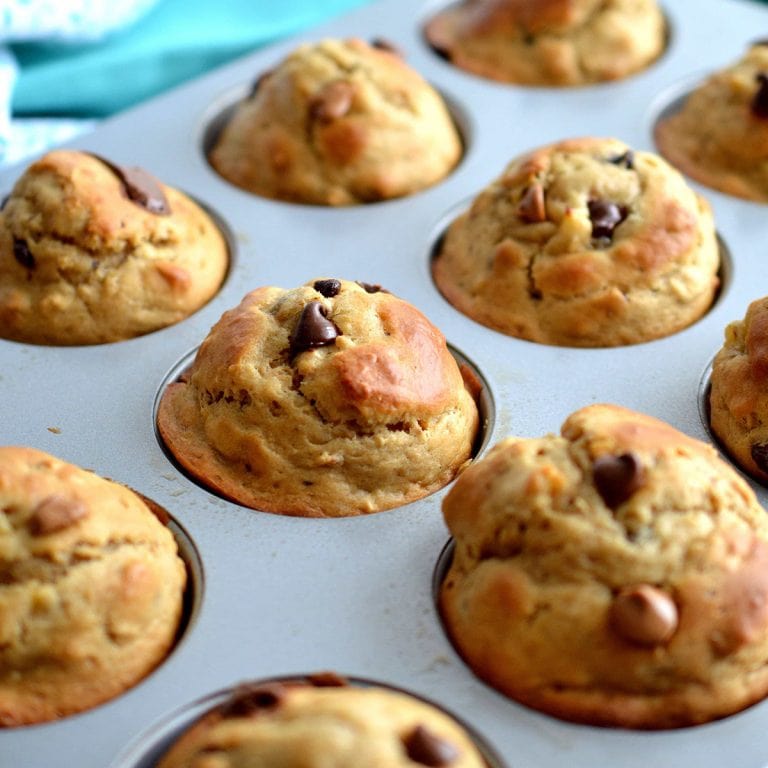 Peanut butter, banana and oatmeal muffins in a muffin pan.