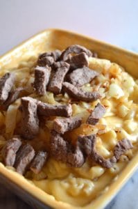 Baked Mac and Cheese Steak Casserole is the ultimate in flavorful comfort food!