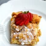 French Toast Casserole is the perfect breakfast or brunch to feed a crowd! Slice this subtly sweet and flavorful breakfast casserole and serve with powdered sugar and maple syrup.