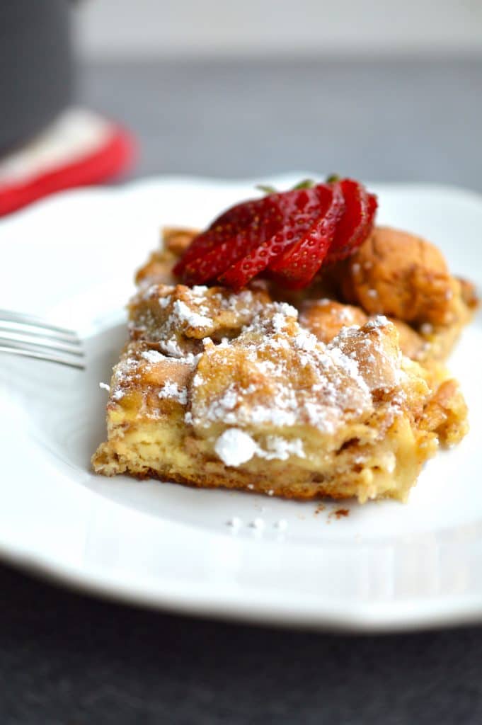 French Toast Casserole is the perfect breakfast or brunch to feed a crowd! Slice this subtly sweet and flavorful breakfast casserole and serve with powdered sugar and maple syrup.