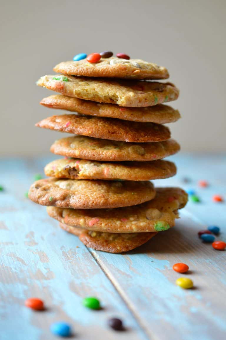 These soft baked cookies are filled with M&Ms candies and are sure to fly off the plate. They are irresistibly fluffy and packed with chocolate!