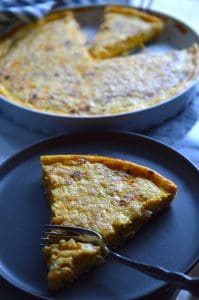 This Cheddar, Bacon & Onion Quiche (aka Quiche Lorraine) is sure to fly off the table during breakfast or brunch. Perfect for feeding a crowd!