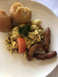 Ackee and saltfish with sausage.