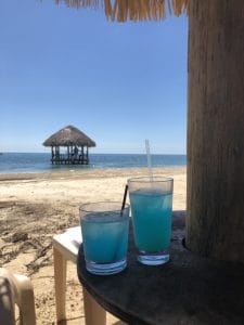 Blue cocktails with an ocean view.
