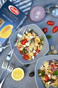 Mediterranean Pasta with Lemon, Garlic and Fresh Vegetables in a gray bowl.
