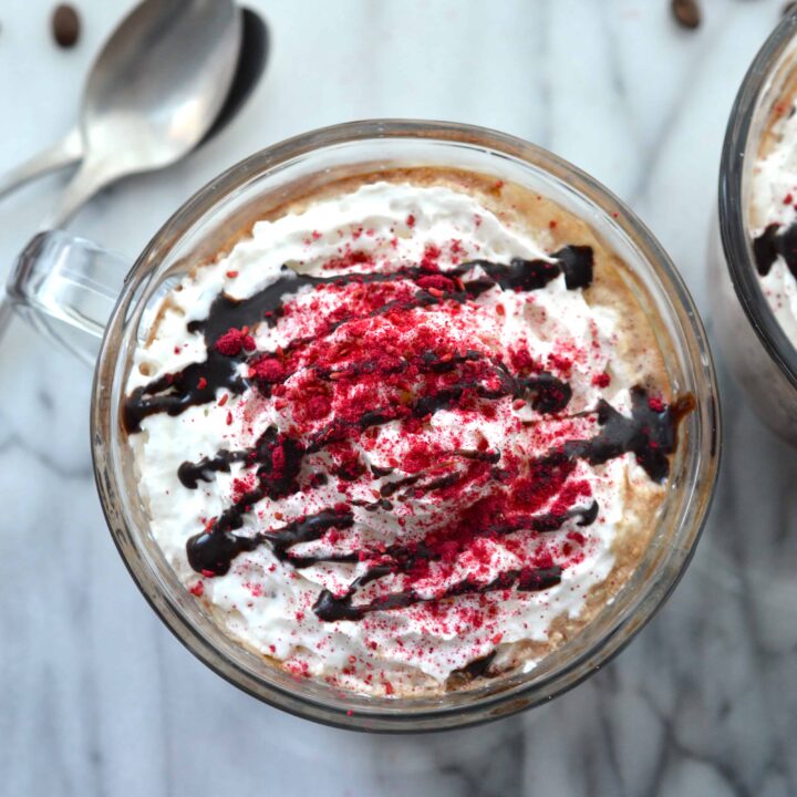 This decadent and rich Raspberry Mocha hits all the right notes - deeply chocolaty and rich, slightly sweet from raspberries and topped with cool whipped cream. Make your own coffeehouse favorite at home for a fraction of the cost.