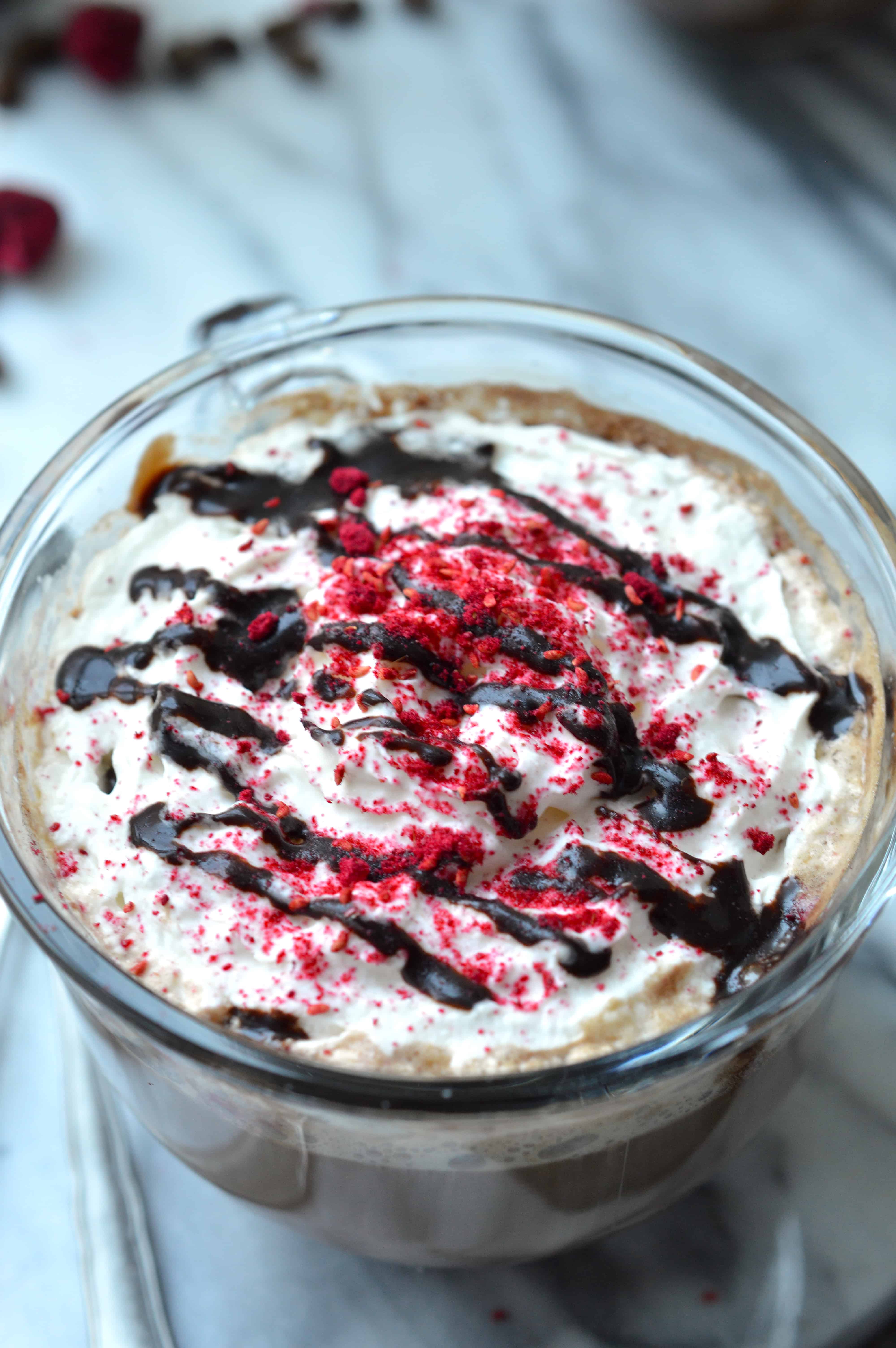This decadent and rich Raspberry Mocha hits all the right notes - deeply chocolaty and rich, slightly sweet from raspberries and topped with cool whipped cream. Make your own coffeehouse favorite at home for a fraction of the cost.