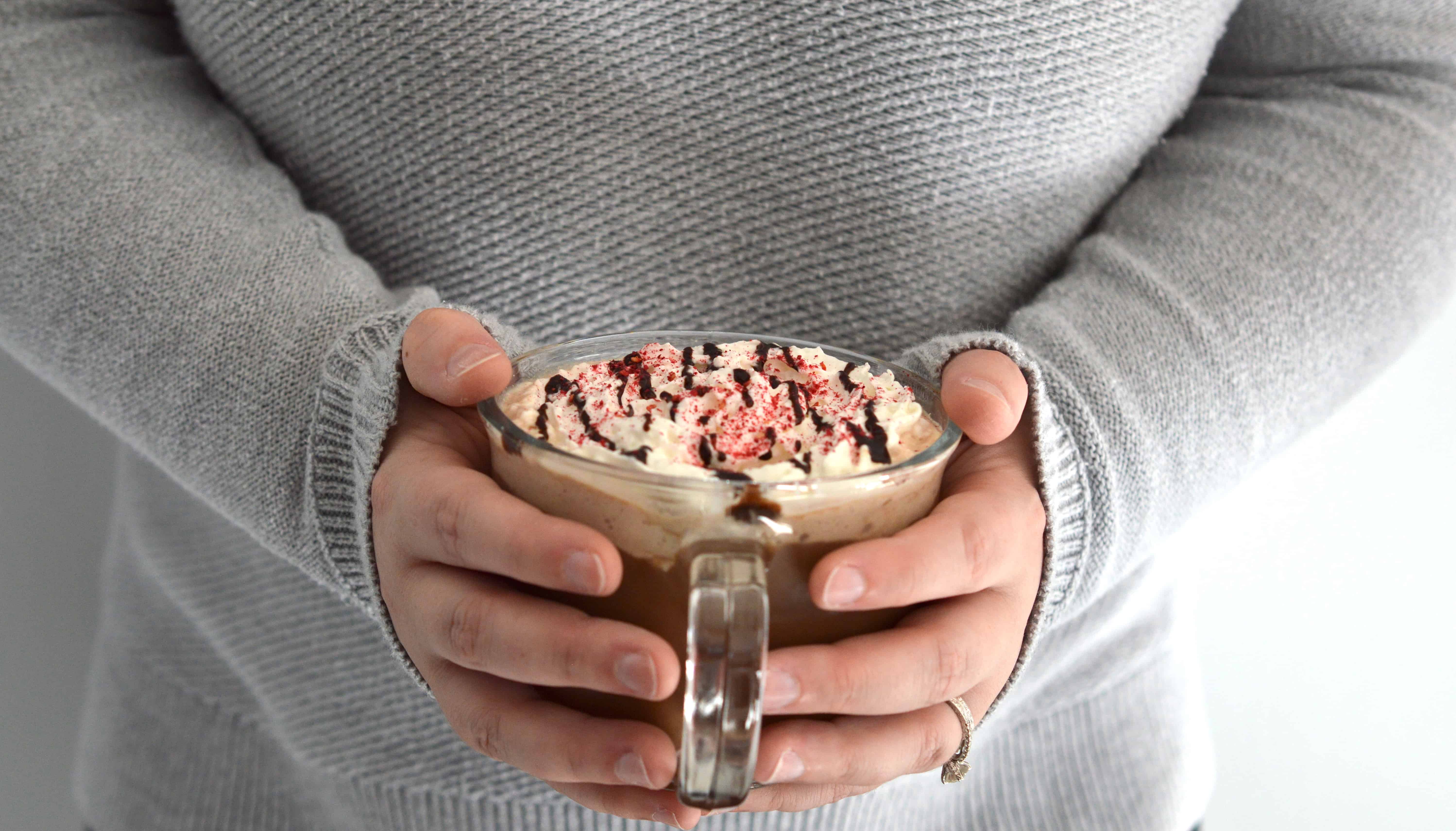 This decadent and rich Raspberry Mocha hits all the right notes - deeply chocolaty and rich, slightly sweet from raspberries and topped with cool whipped cream. Make your own coffeehouse favorite at home for a fraction of the cost.