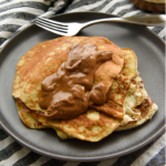 Healthy Banana Pancakes on a plate with a dollop of almond butter